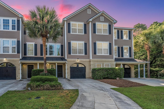 2954 Woodland Park Dr, Mount Pleasant, SC 29466 - view of property featuring concrete driveway, a standing seam roof, and metal roof