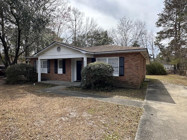 view of front of home with brick siding