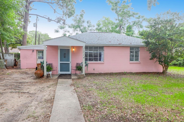 1514 Patterson Ave, Charleston, SC 29412 - view of front of home featuring concrete block siding and roof with shingles
