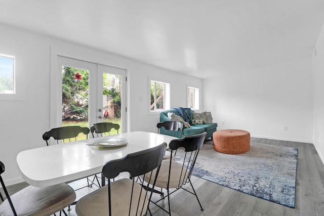 1514 Patterson Ave, Charleston, SC 29412 - dining space with plenty of natural light, wood finished floors, and baseboards