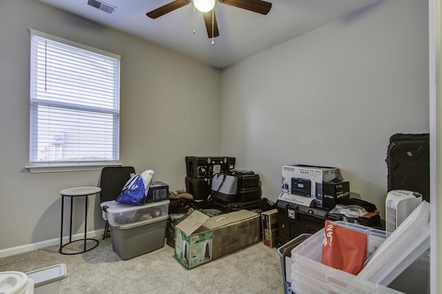 misc room featuring carpet, ceiling fan, and a wealth of natural light