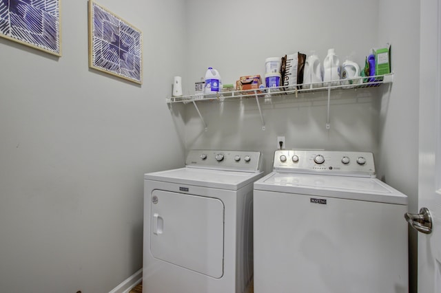 laundry room with independent washer and dryer