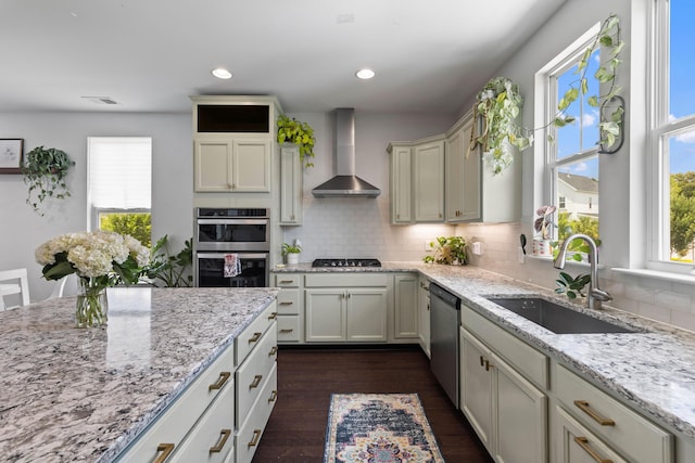 4419 Louisa Ln, North Charleston, SC 29405 - kitchen featuring wall chimney exhaust hood, stainless steel appliances, dark wood-style floors, backsplash, and light stone counters