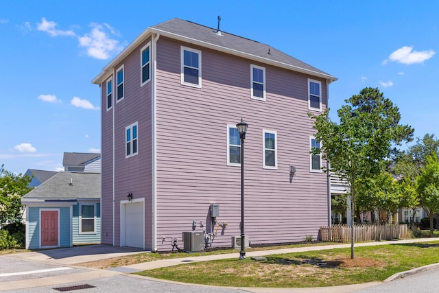 4419 Louisa Ln, North Charleston, SC 29405 - view of home's exterior featuring an attached garage and concrete driveway