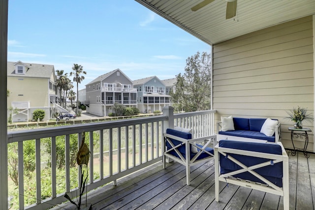 wooden deck with ceiling fan