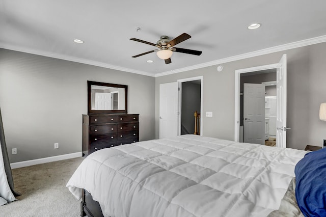 carpeted bedroom with ceiling fan and ornamental molding