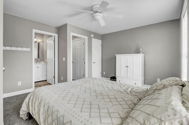 bedroom featuring carpet flooring, ceiling fan, and ensuite bathroom