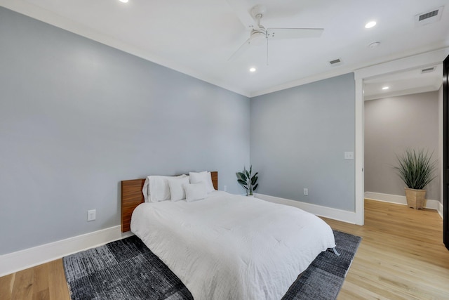 bedroom featuring ceiling fan and light wood-type flooring