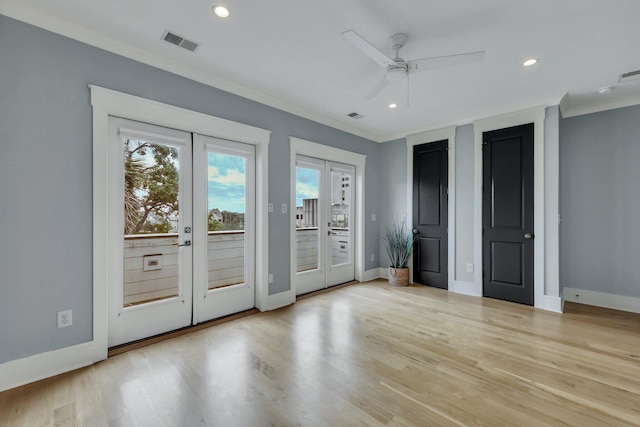 interior space with ceiling fan, french doors, light wood-type flooring, access to outside, and ornamental molding