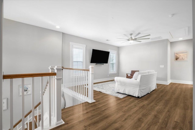 living room with dark hardwood / wood-style floors