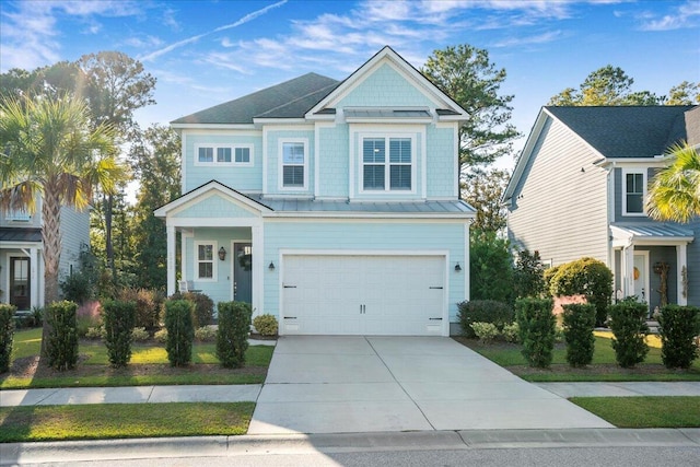 view of front of home with a garage