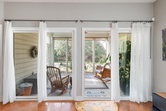 doorway featuring hardwood / wood-style flooring