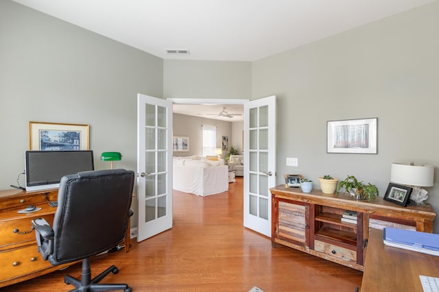 office area featuring french doors and hardwood / wood-style floors