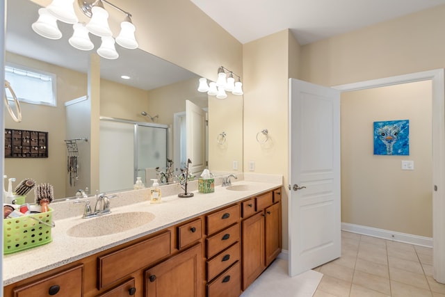 bathroom featuring vanity, an enclosed shower, and tile patterned flooring