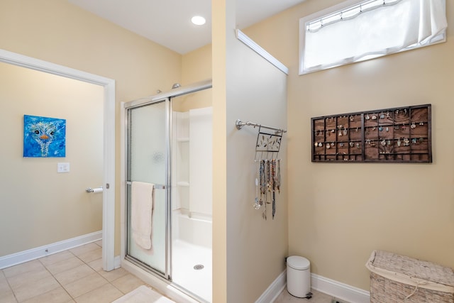 bathroom featuring tile patterned floors and walk in shower