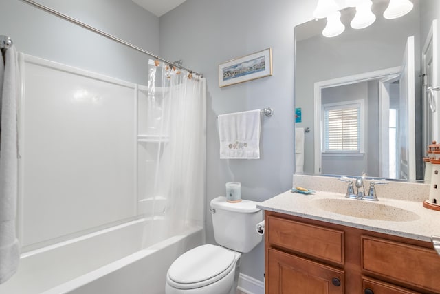 full bathroom with shower / bath combination with curtain, vanity, and toilet