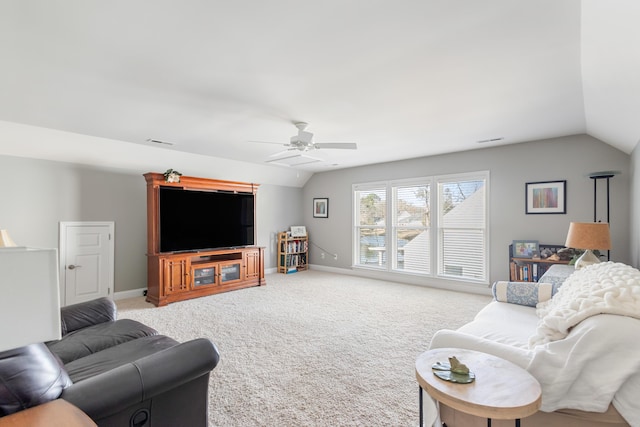 living room featuring lofted ceiling, ceiling fan, and carpet