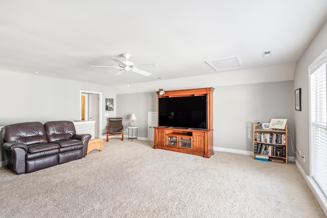 living room with carpet floors and ceiling fan