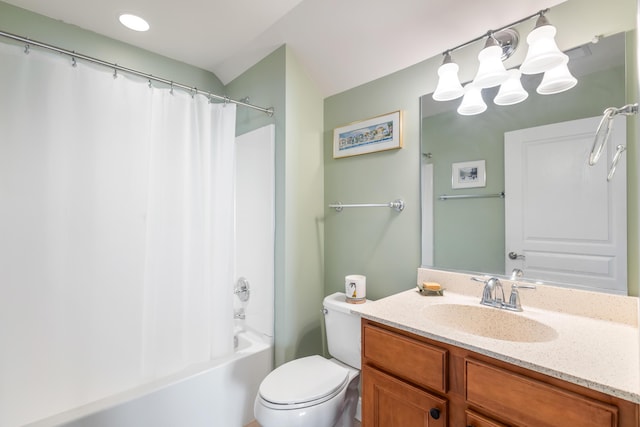 full bathroom with vanity, shower / tub combo, and toilet