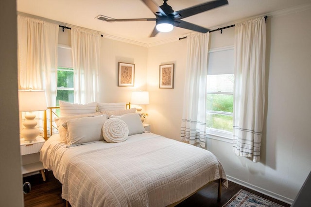 1137 Dickson Ave, Hanahan, SC 29410 - bedroom with dark wood finished floors, ornamental molding, and ceiling fan