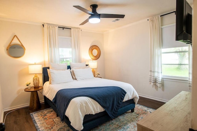 1137 Dickson Ave, Hanahan, SC 29410 - bedroom featuring wood finished floors, ornamental molding, multiple windows, and a ceiling fan