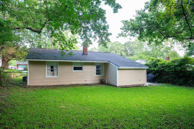 1137 Dickson Ave, Hanahan, SC 29410 - rear view of house featuring a chimney
