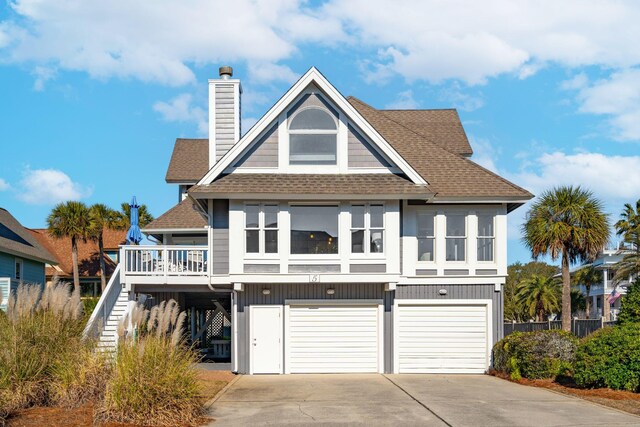 coastal home featuring a garage