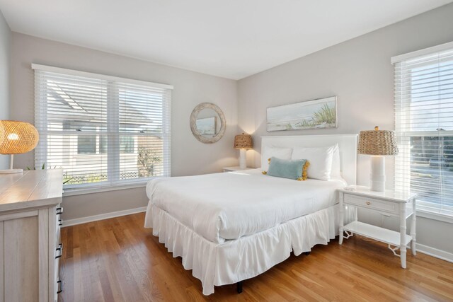 bedroom with wood-type flooring