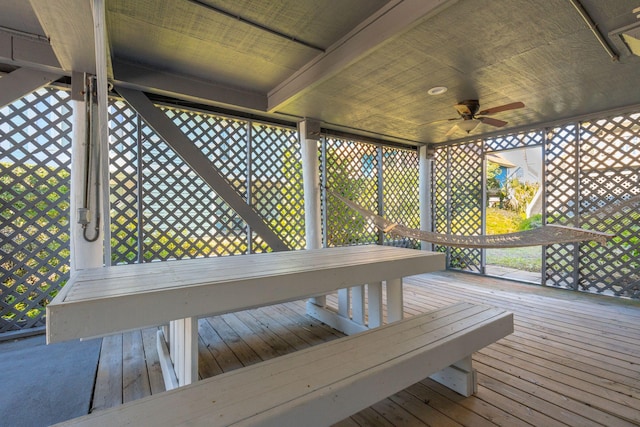 wooden deck with ceiling fan