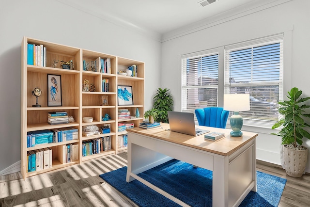 office area featuring ornamental molding and hardwood / wood-style floors