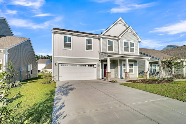 craftsman inspired home featuring a front yard and a garage