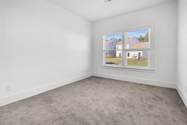 view of carpeted spare room