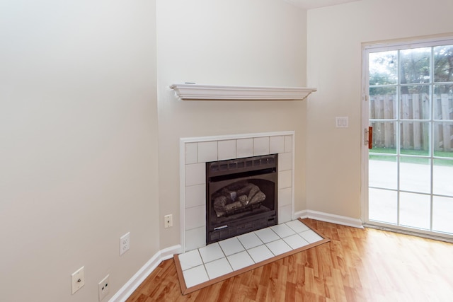 details featuring a fireplace and hardwood / wood-style floors