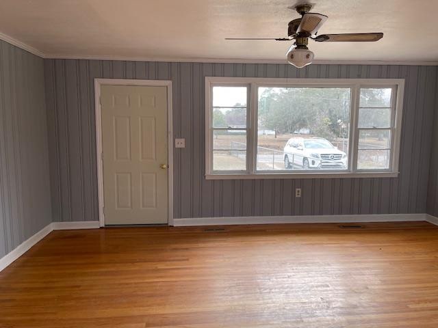 entrance foyer with light hardwood / wood-style floors and ceiling fan