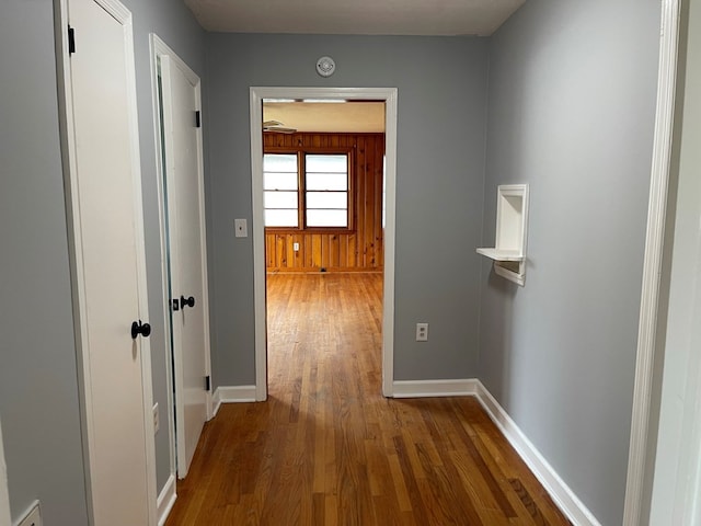 hallway featuring dark wood-type flooring