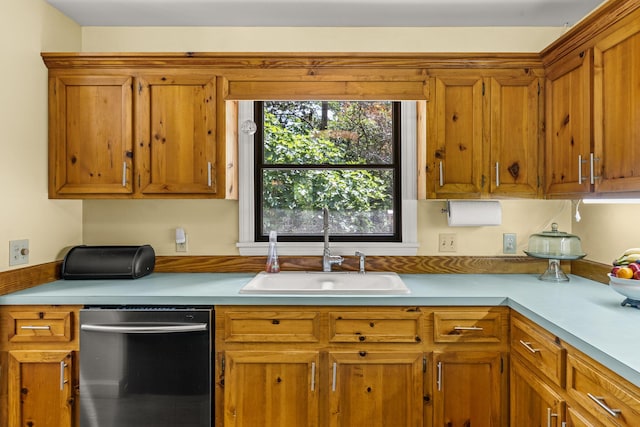 2144 Pinopolis Rd, Pinopolis, SC 29469 - kitchen with brown cabinets, stainless steel dishwasher, a sink, and light countertops