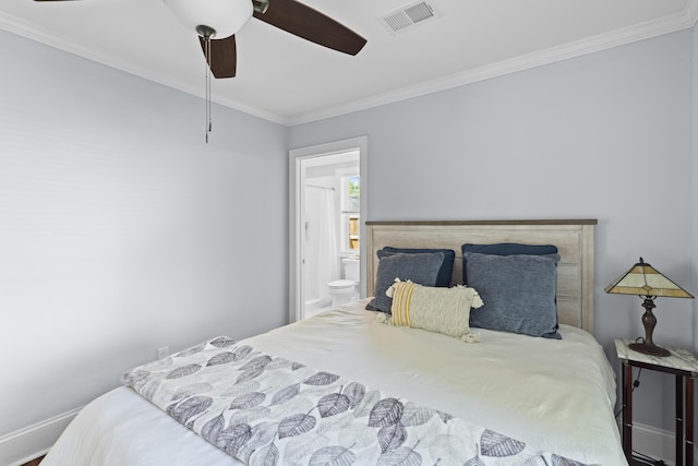 bedroom with visible vents, a ceiling fan, crown molding, baseboards, and ensuite bathroom