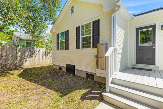 view of property exterior with fence