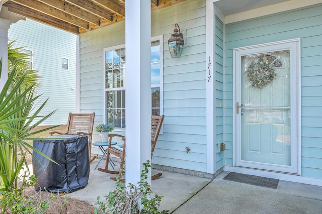 entrance to property with a porch