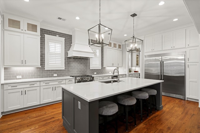 3739 Goodwater St, Mount Pleasant, SC 29466 - kitchen featuring stainless steel built in refrigerator, a sink, stove, a kitchen island with sink, and a breakfast bar