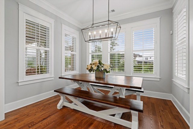3739 Goodwater St, Mount Pleasant, SC 29466 - dining area featuring a chandelier, dark wood-type flooring, plenty of natural light, crown molding, and baseboards