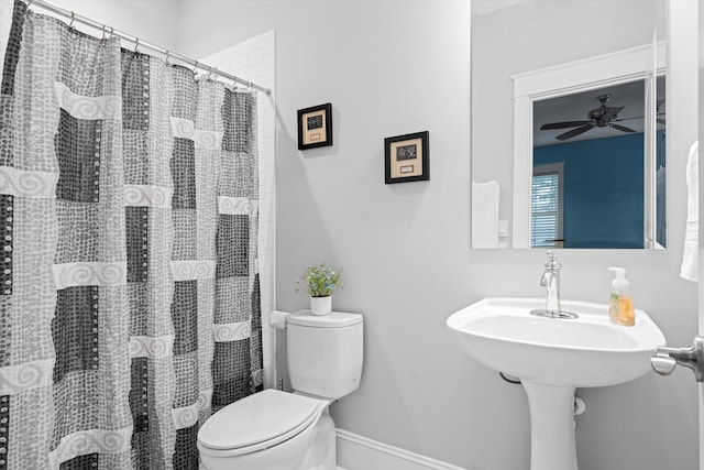 3739 Goodwater St, Mount Pleasant, SC 29466 - bathroom featuring toilet, a ceiling fan, baseboards, and curtained shower