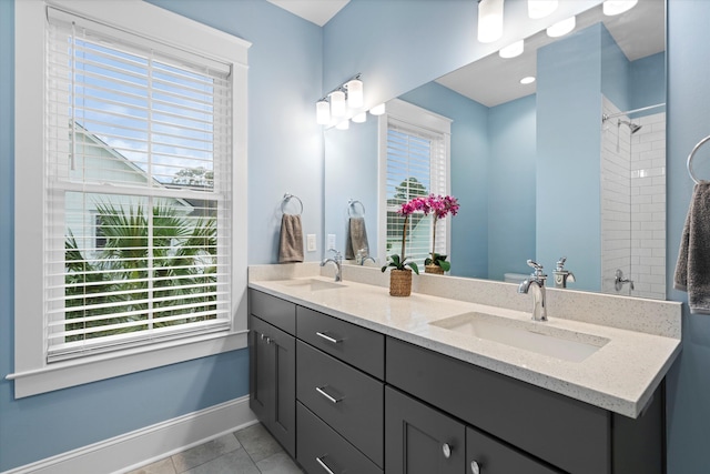 3739 Goodwater St, Mount Pleasant, SC 29466 - full bathroom featuring double vanity, healthy amount of natural light, baseboards, and tile patterned floors