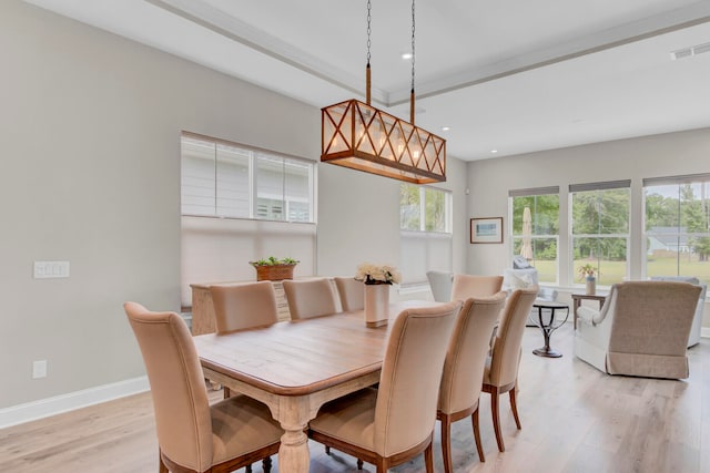 dining space featuring light hardwood / wood-style flooring