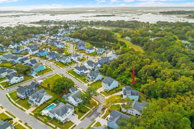 drone / aerial view with a water view