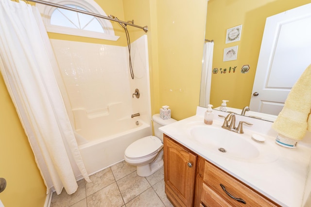 bathroom featuring toilet, vanity, shower / tub combo, and tile patterned flooring