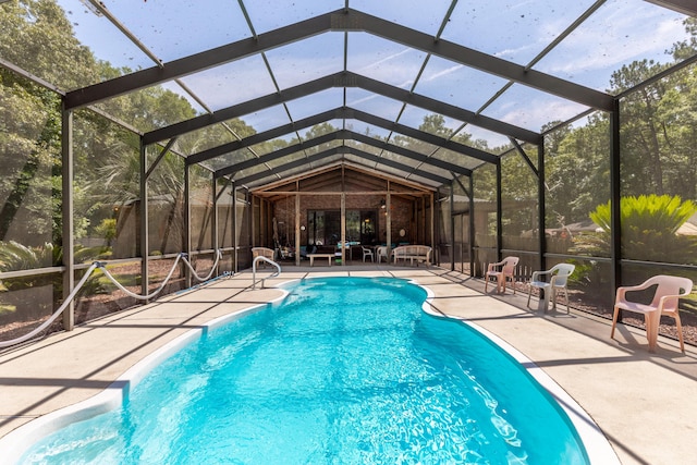 view of pool featuring a lanai and a patio area