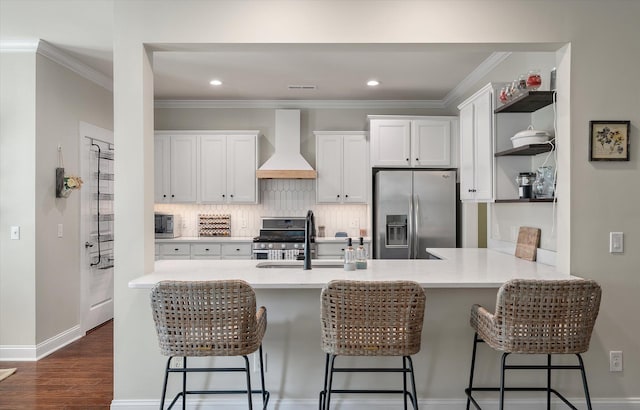 2627 Rutherford Way, Charleston, SC 29414 - kitchen with premium range hood, stainless steel appliances, open shelves, light countertops, and a sink