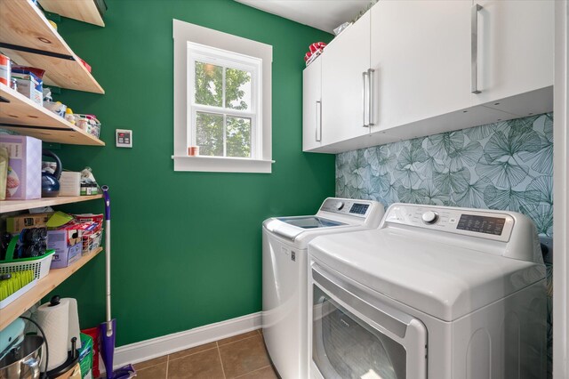 2627 Rutherford Way, Charleston, SC 29414 - clothes washing area with cabinet space, independent washer and dryer, baseboards, and dark tile patterned flooring