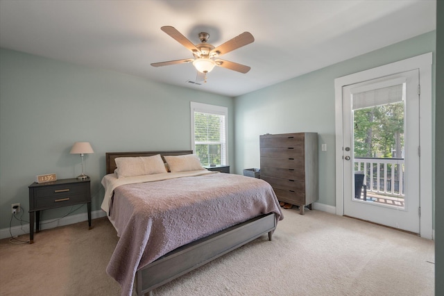 2627 Rutherford Way, Charleston, SC 29414 - bedroom with access to exterior, light carpet, baseboards, and a ceiling fan